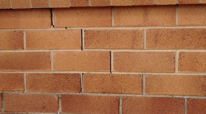 A photo of a crack in brickwork